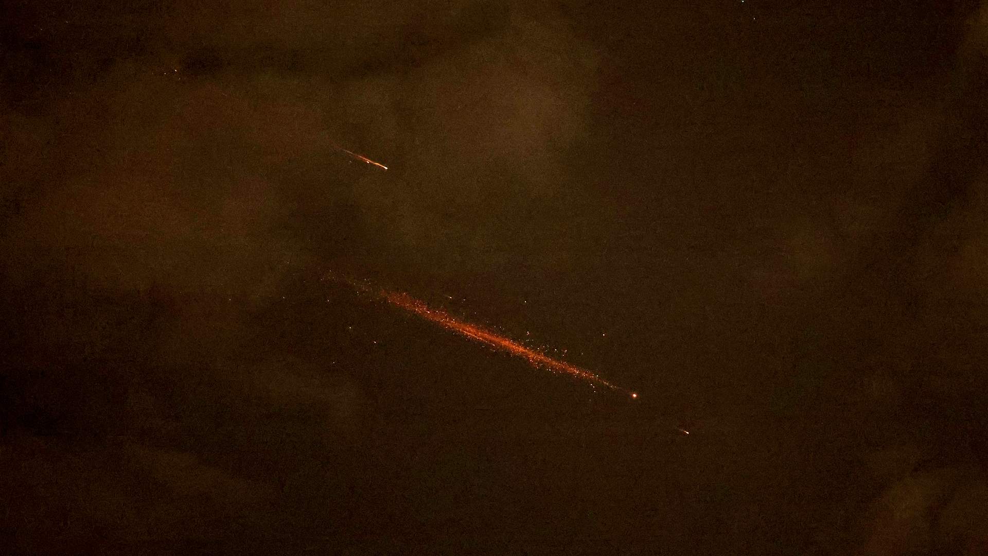 Kuwait's military says air defenses are responding to drone attacks