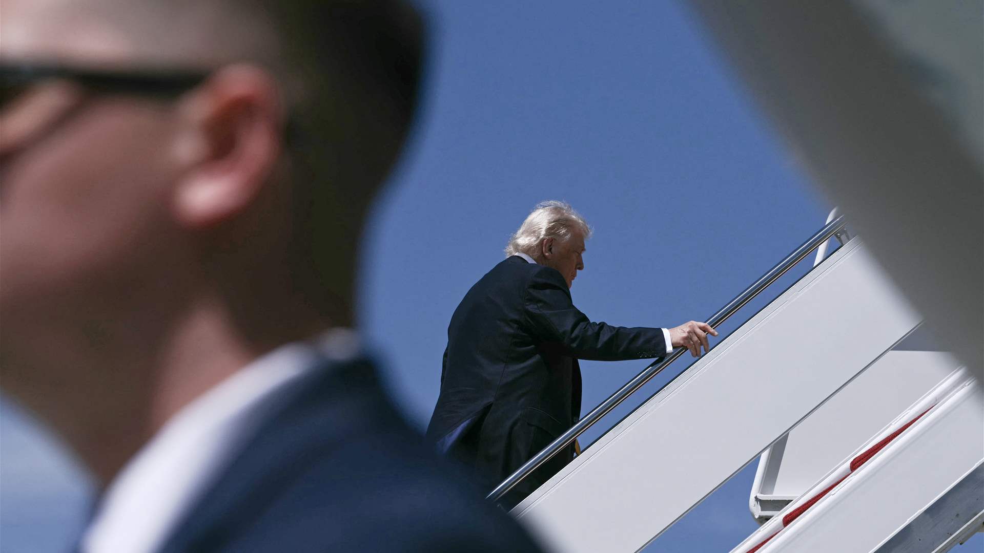 Trump takes off on long-awaited China trip