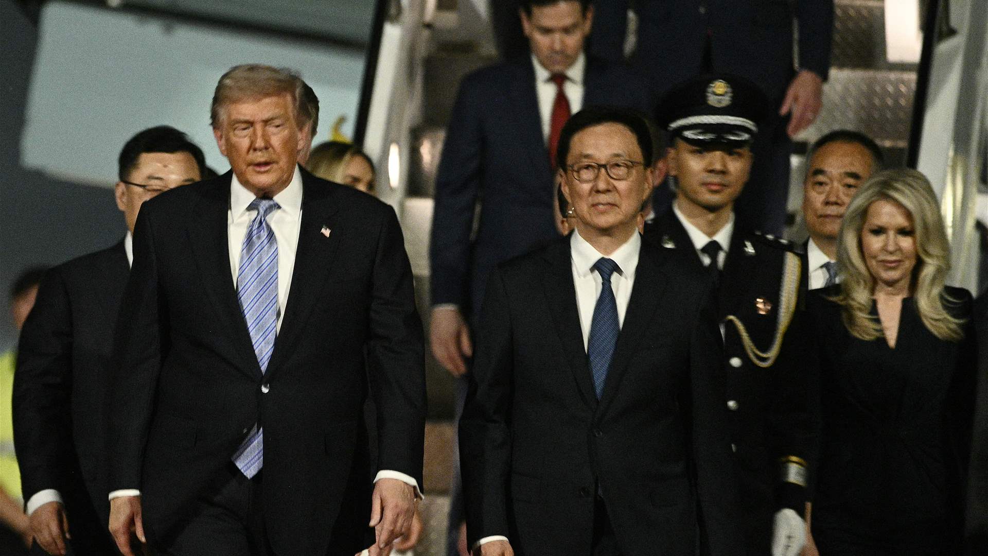 Trump arrives in China for superpower summit with Xi