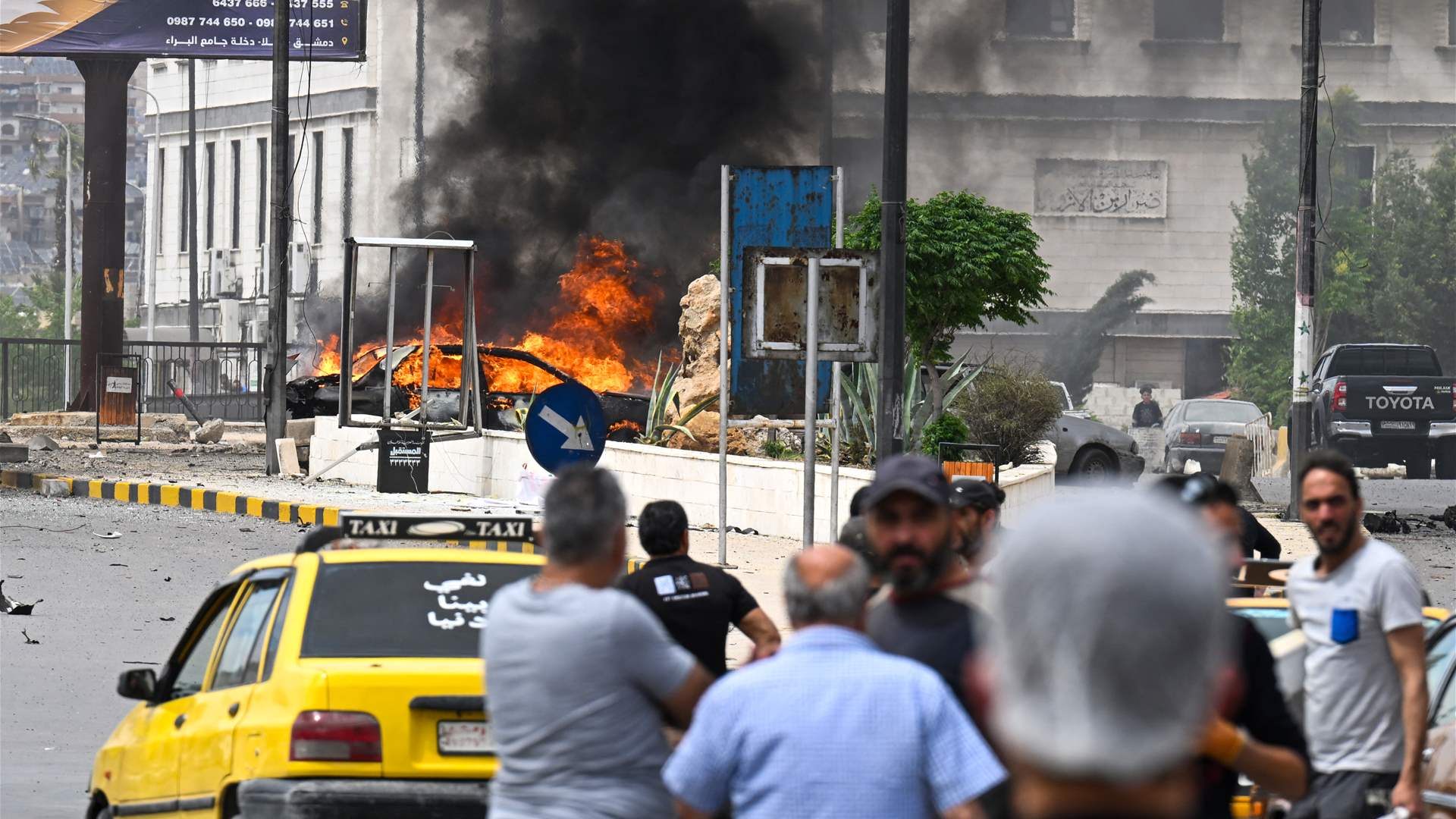 Syrian soldier killed, 18 people wounded by car bomb in Damascus