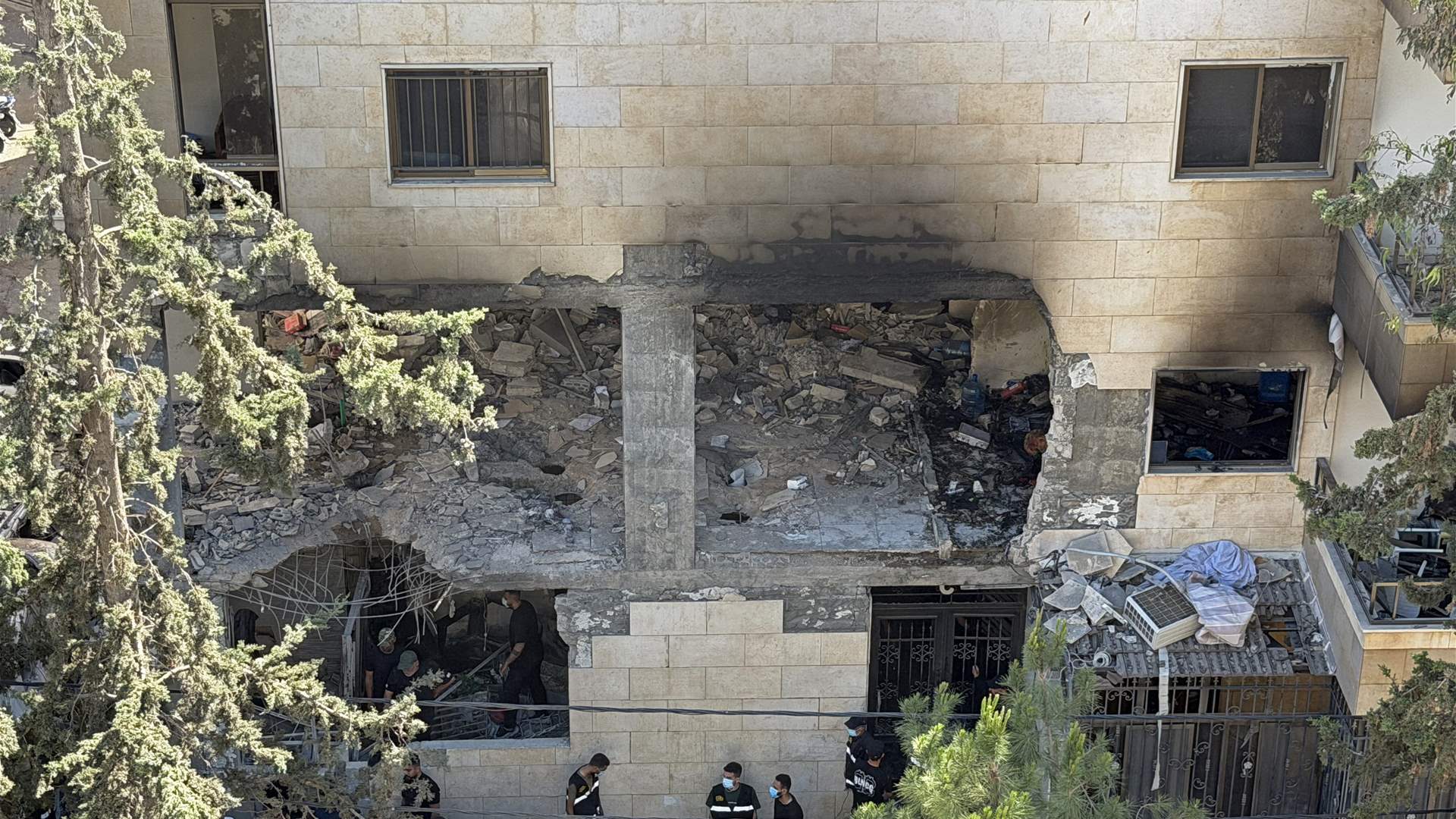 Israeli strike hits south of Beirut as Lebanon says raids kill 14