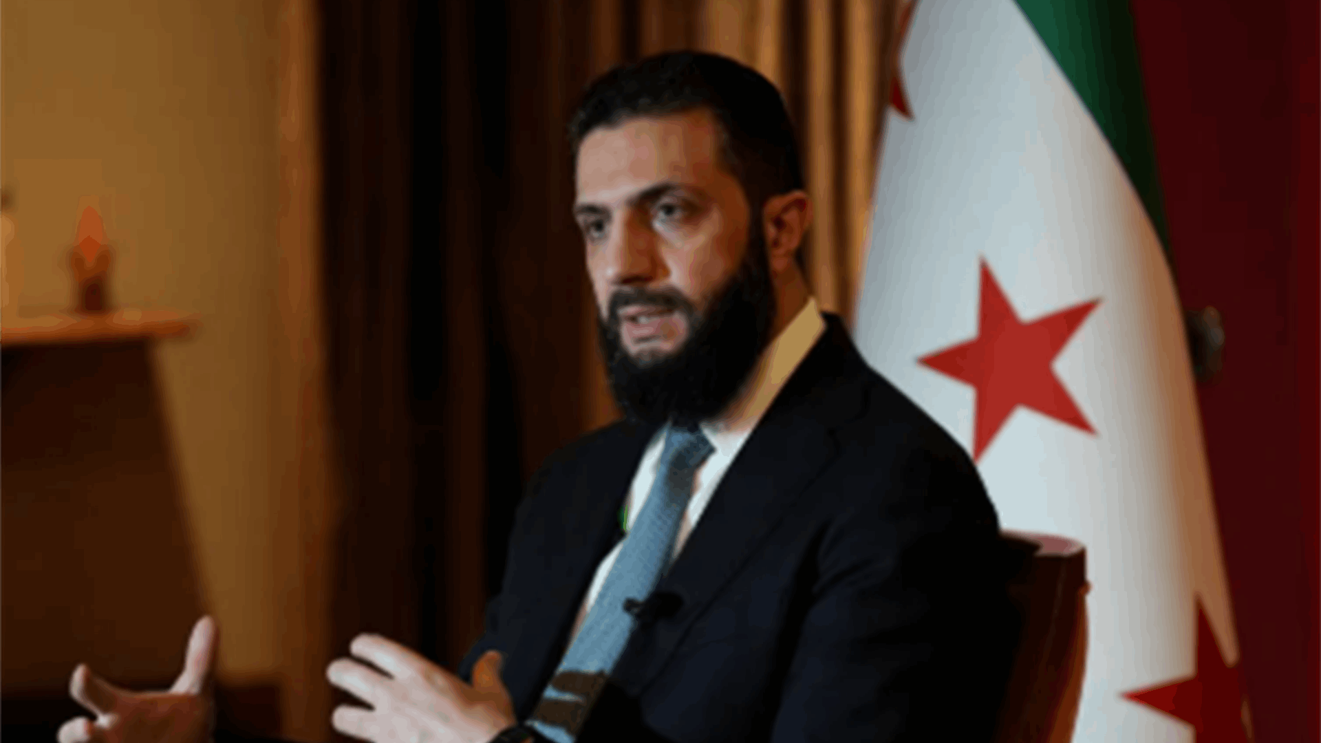 Syria president hails France's 'constructive role' in transition as Macron visits