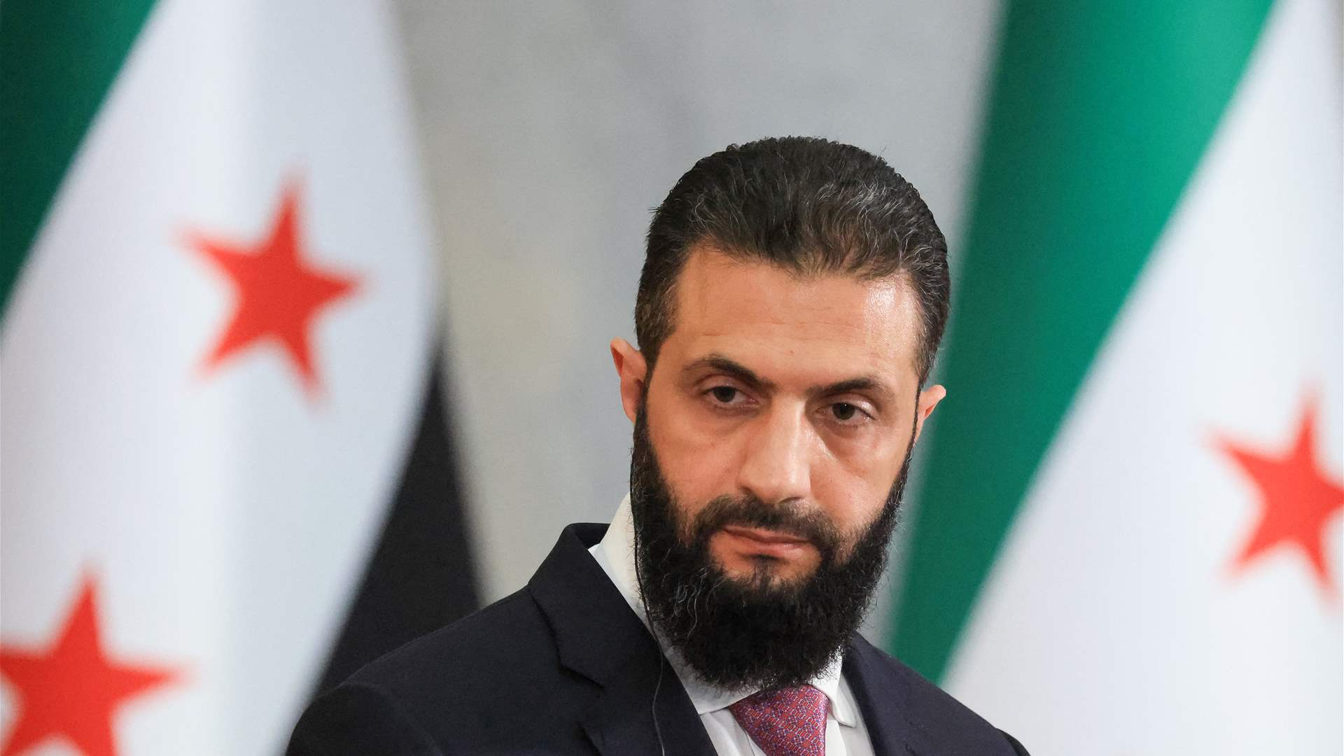 Syria President says agreed with France to install ambassadors 'as soon as possible'