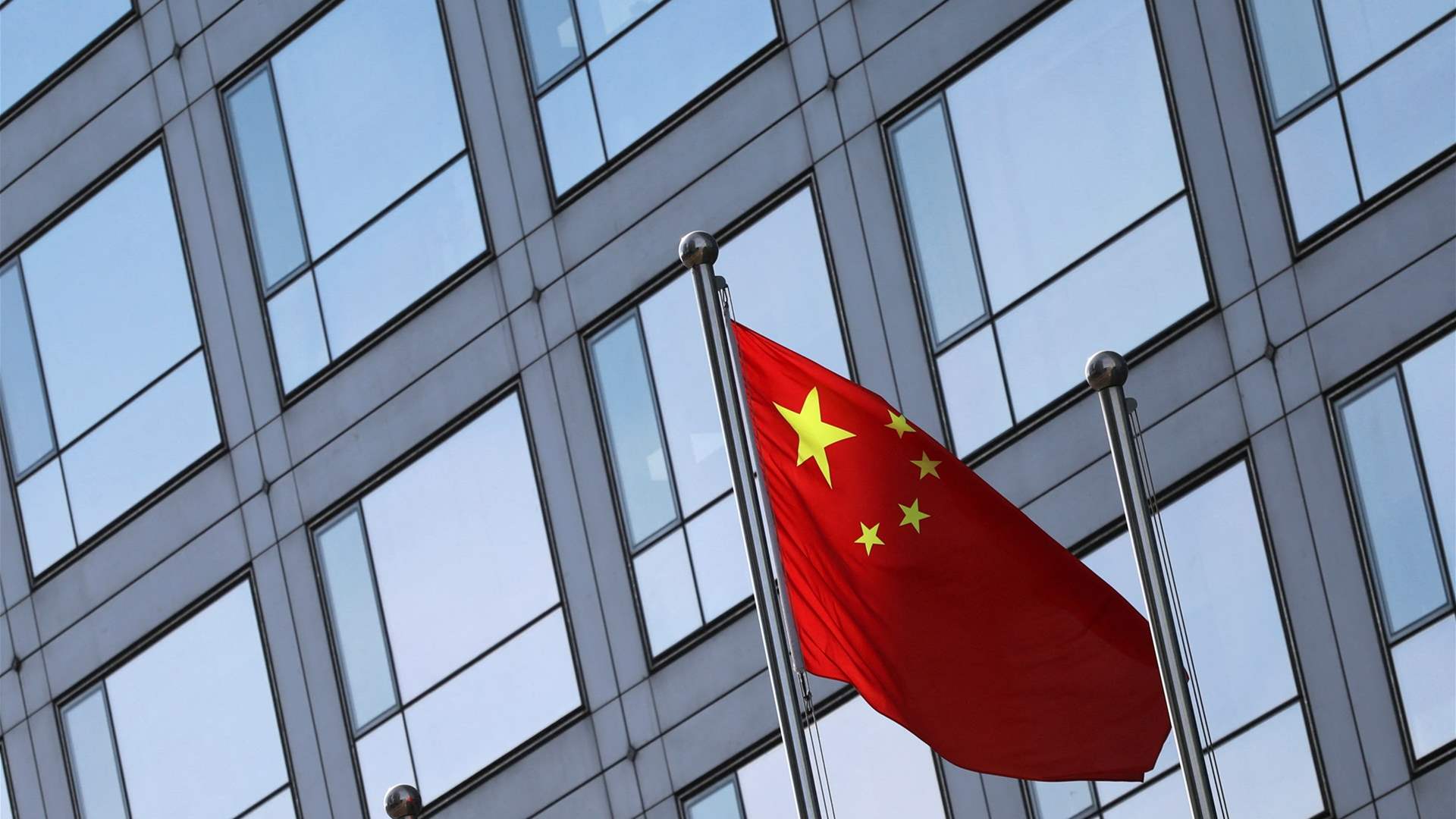 China says it opposes new US tariffs, warns against trade wars