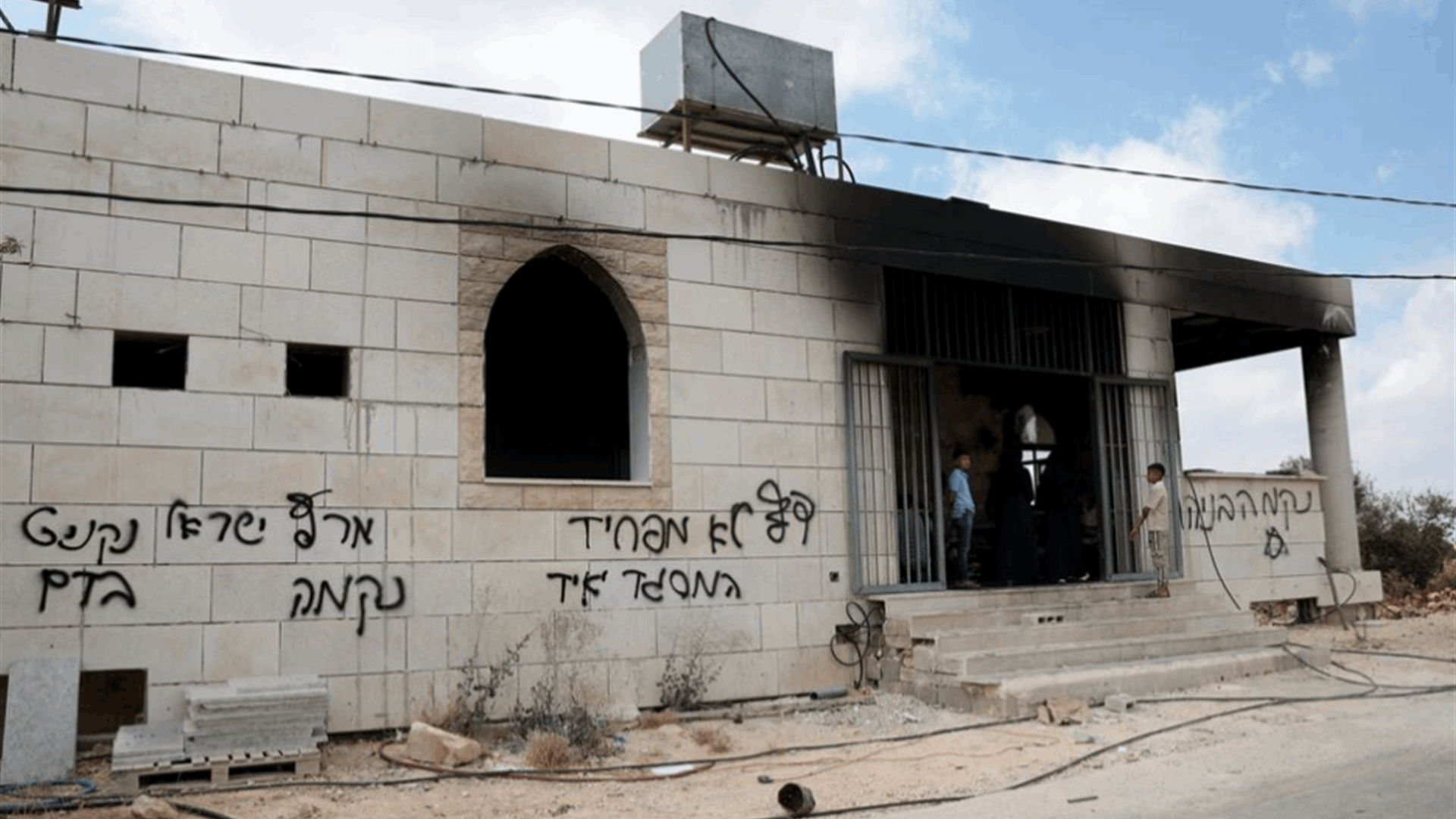Israeli settlers set fire to West Bank mosques after deadly clash