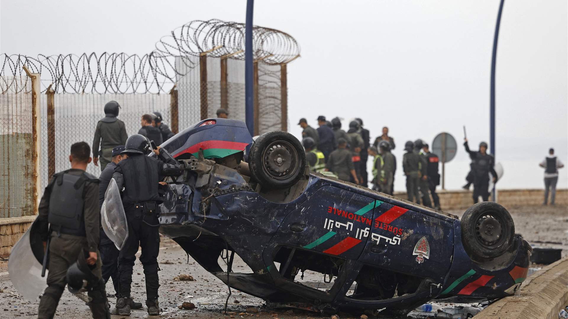 Spain boosts police deployment to Ceuta as migrant crisis swells