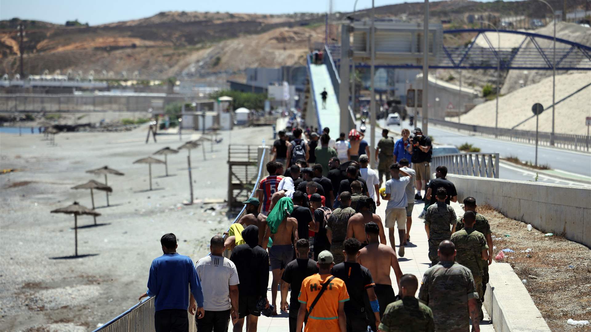 Spain warns Italy of countermeasures if border checks kept