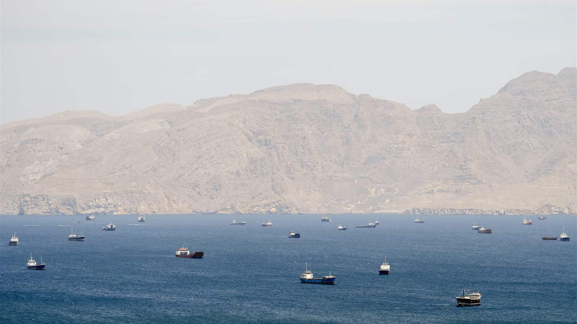 Iran Guards say two oil tankers on fire after hitting mines in Hormuz