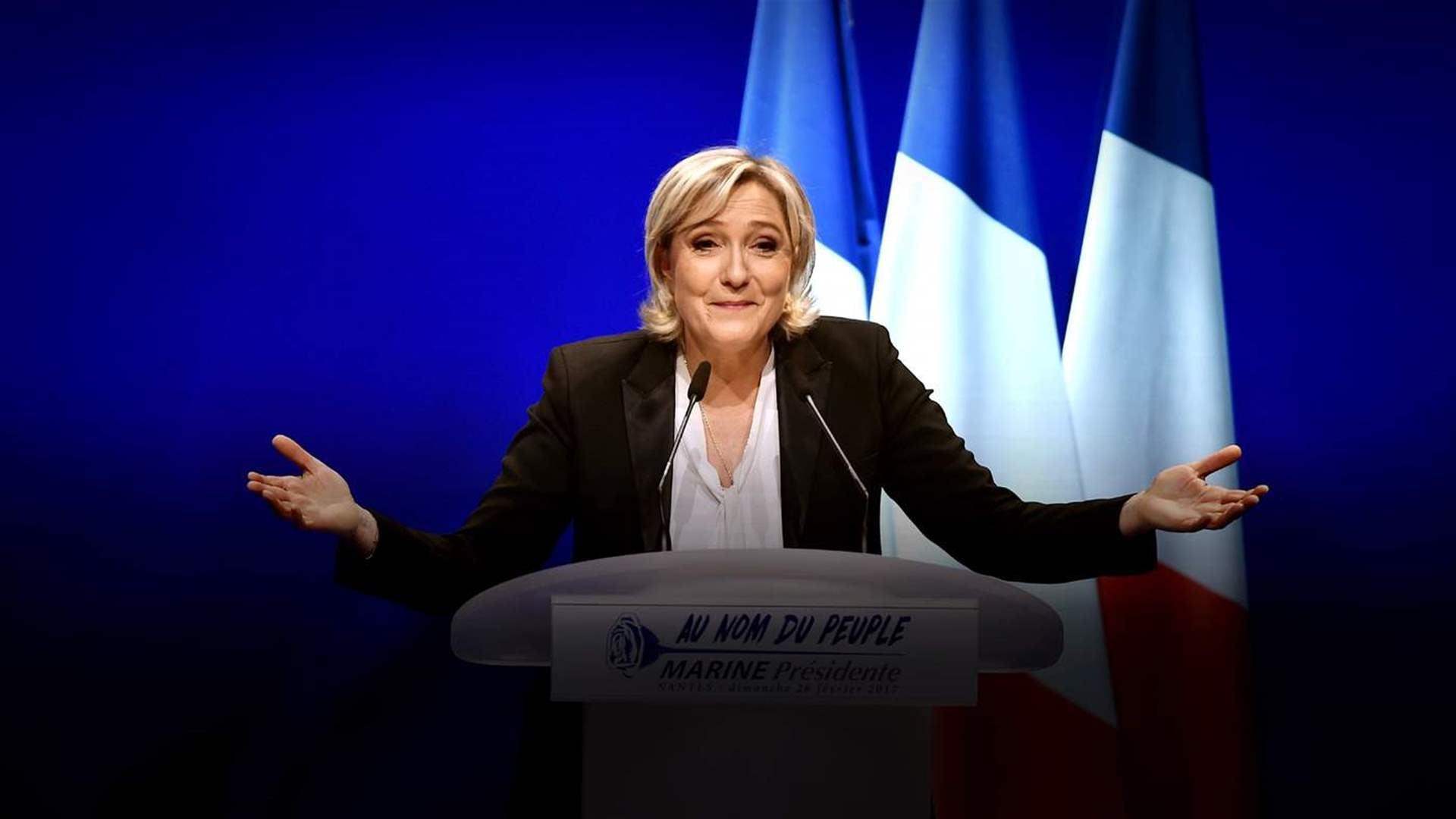 Le Pen vows drastic cost savings to prevent French 'default'