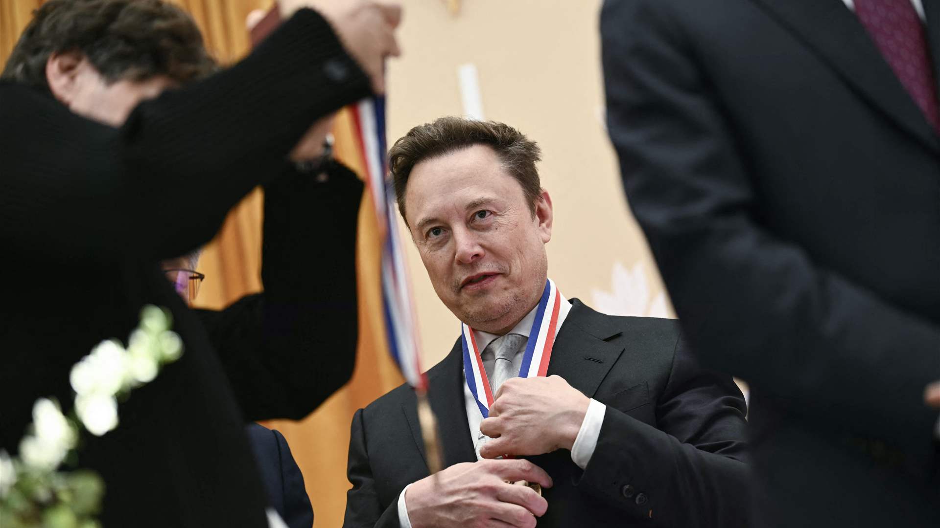 Musk calls on Ukraine's Zelensky to 'go' after satellite slowdown row