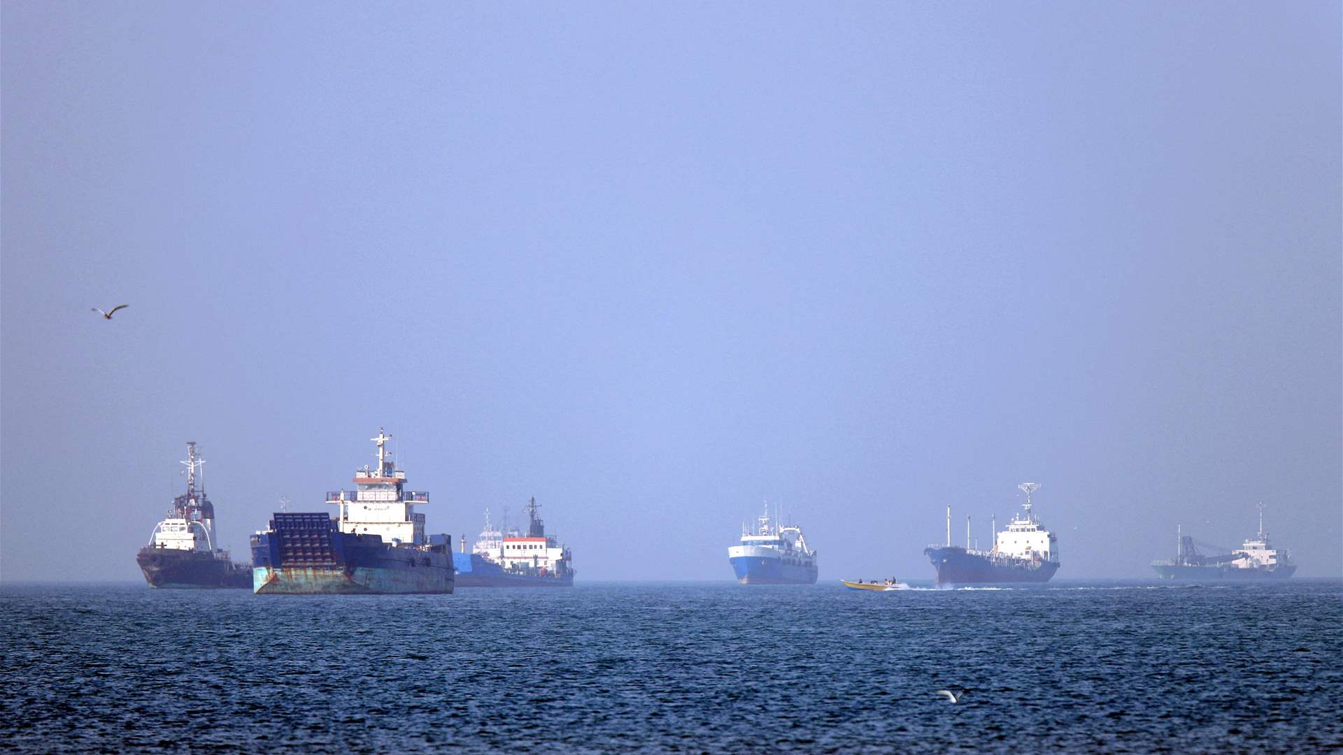 Iran's Guards say two tankers hit mines in Strait of Hormuz