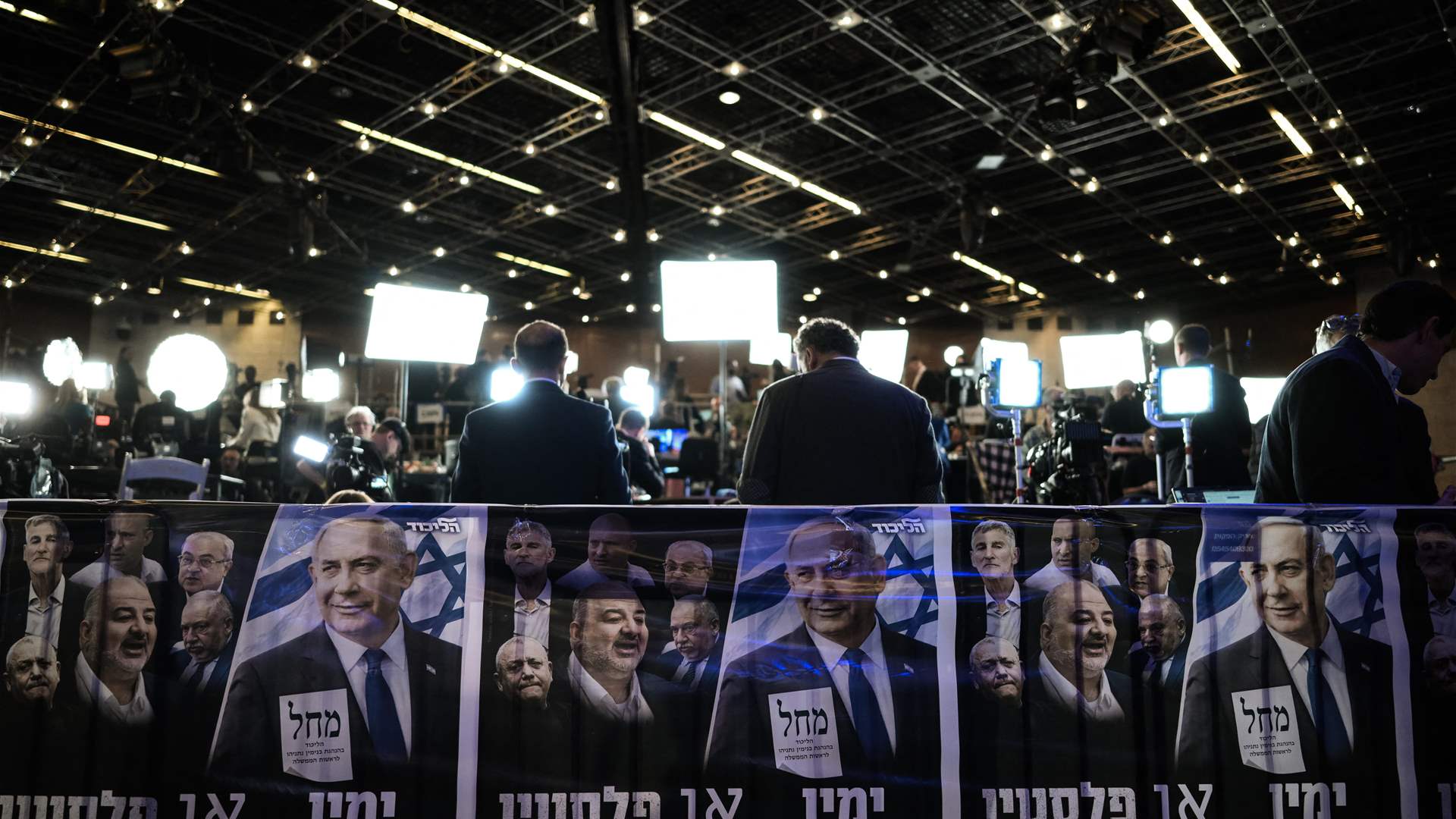 First Israeli election exit polls show narrow edge for opposition
