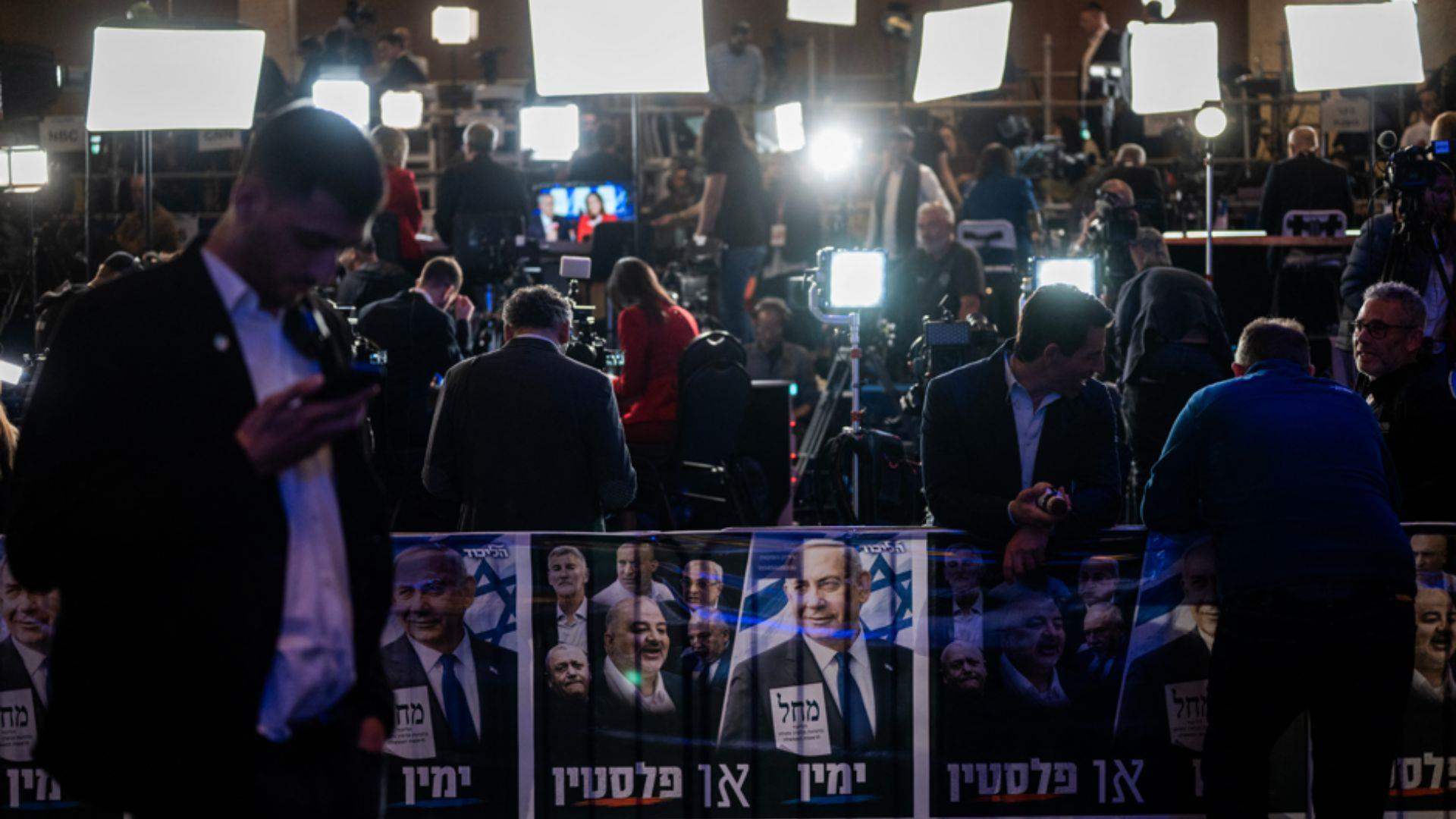 Israel FM says opposition celebrations 'premature' after exit polls show lead