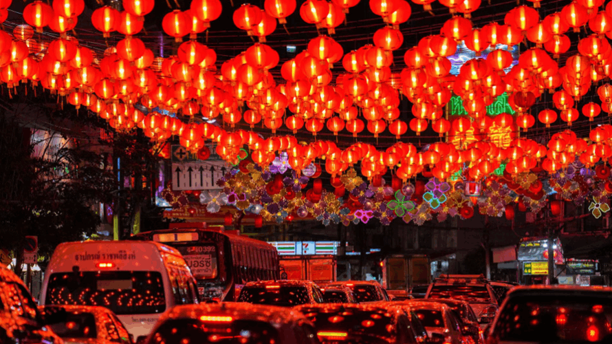 For Chinese Lunar New Year tourists, retailers roll out rabbit dances, red lanterns