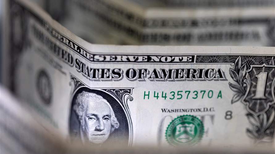 Dollar weakens after US jobs data suggests slower rate hike path