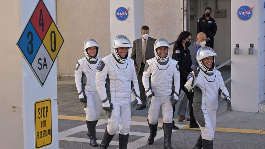 SpaceX capsule returns crew of four from space station mission