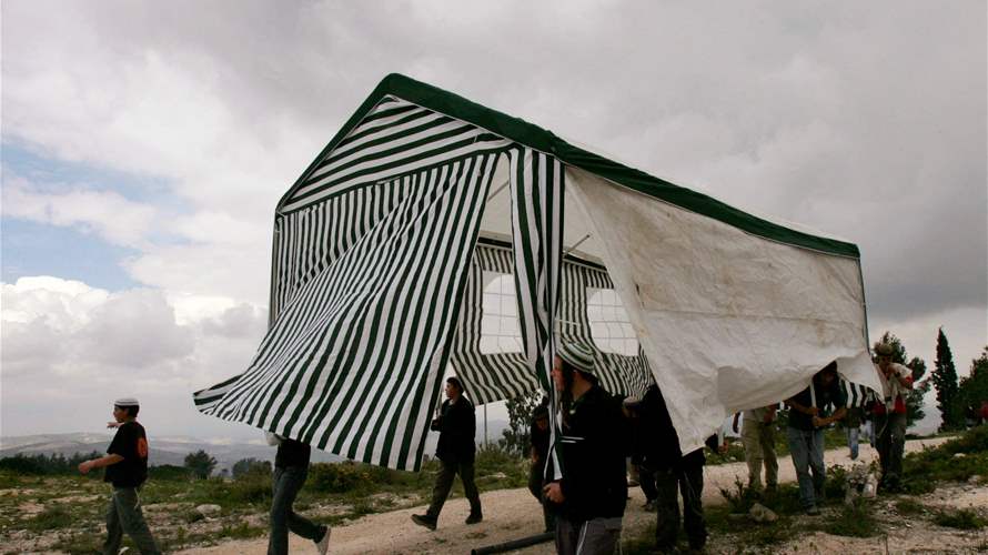 Israeli government lifts ban on return to West Bank settlements