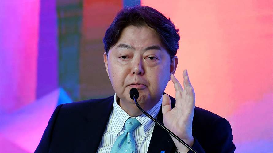 Japan's foreign minister calls for early release of detained national during talks in China