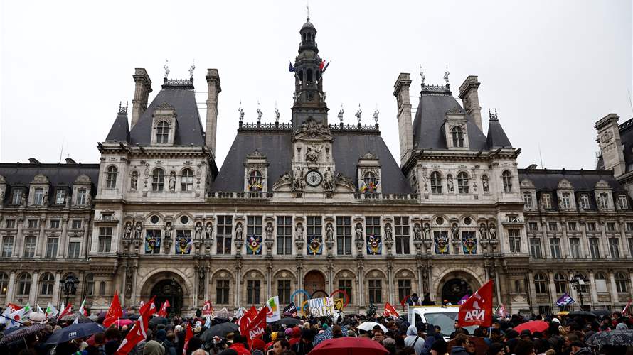 France's Macron signs contested pension law as unions plan more protests