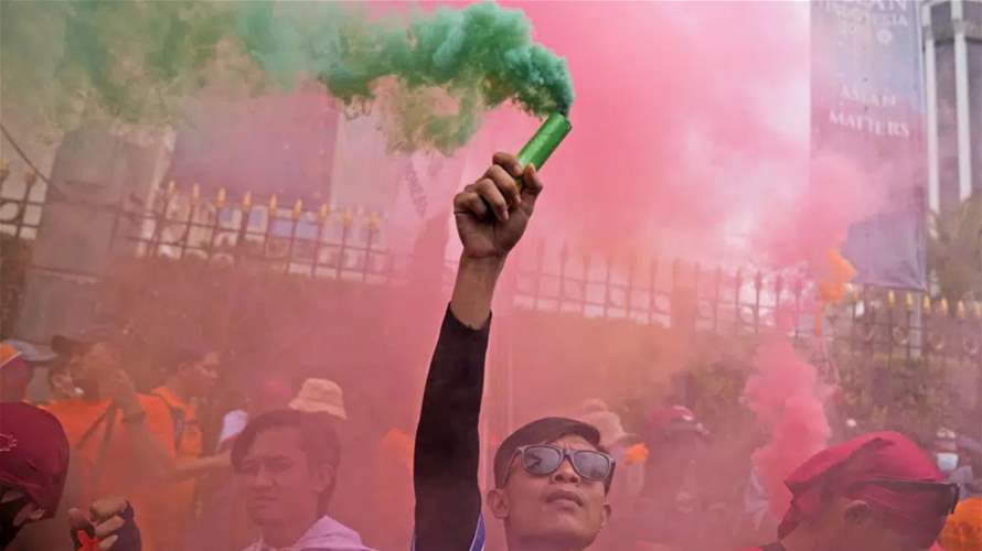 World’s workers rally on May Day; France braces for protests