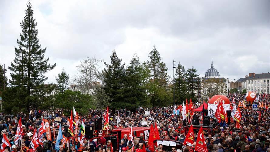 Paris police fire tear gas as French march against pension reform