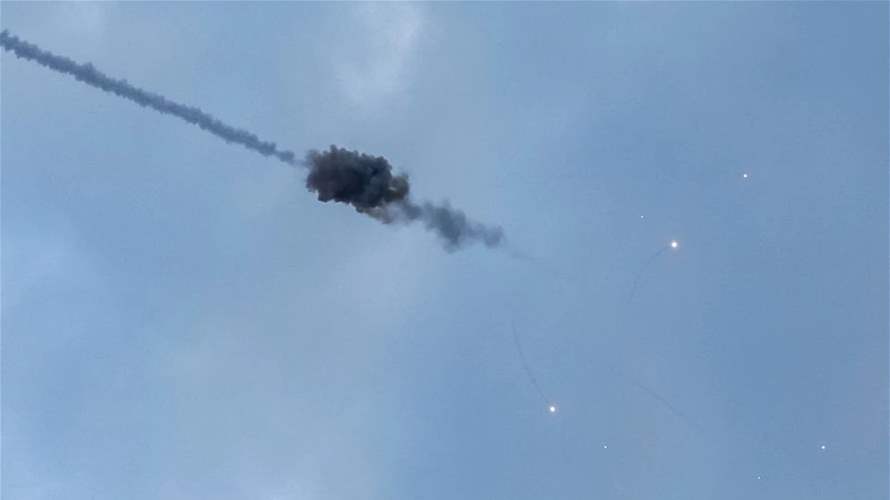 Russia fires missiles at Ukraine before Putin presides over parade