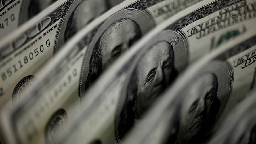 Dollar edges lower after US retail sales data