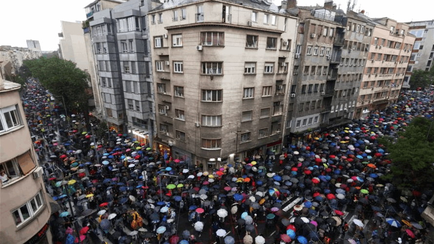Tens of thousands in Serbia protest mass shootings, government policies