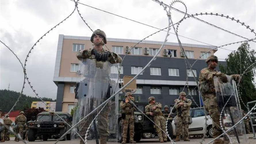 NATO peacekeepers secure Kosovo town halls in standoff with Serb protesters