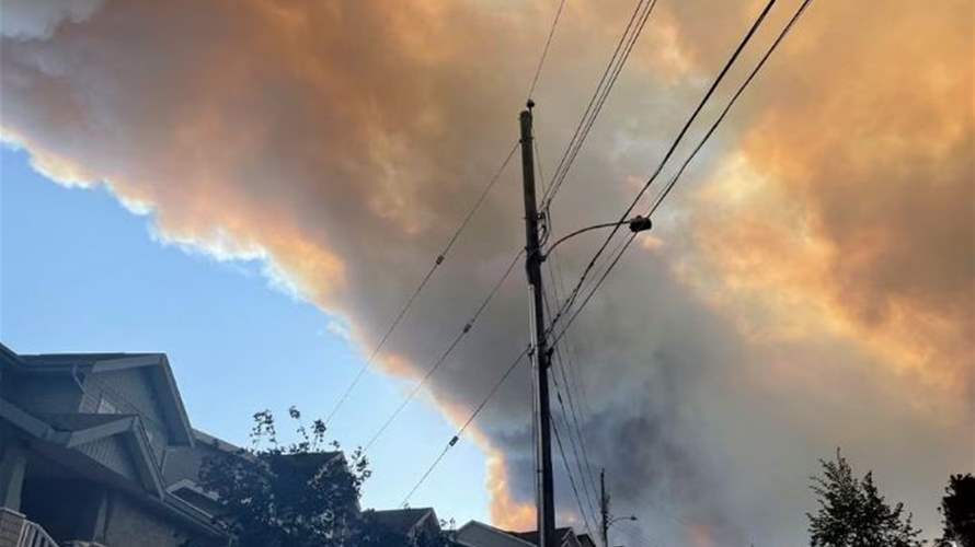 Raging wildfire empties homes in eastern Canada, pollutes air in US