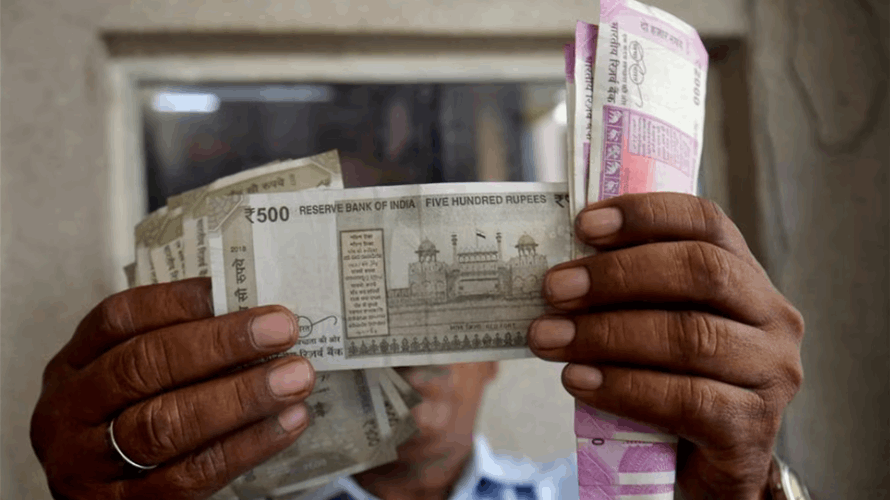 Rupee reaches 2-wk high on weak dollar, eyes US jobs data