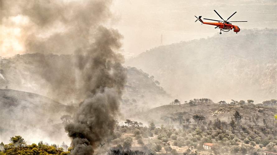 Three people killed by forest fires in Greece amid continuing heatwaves