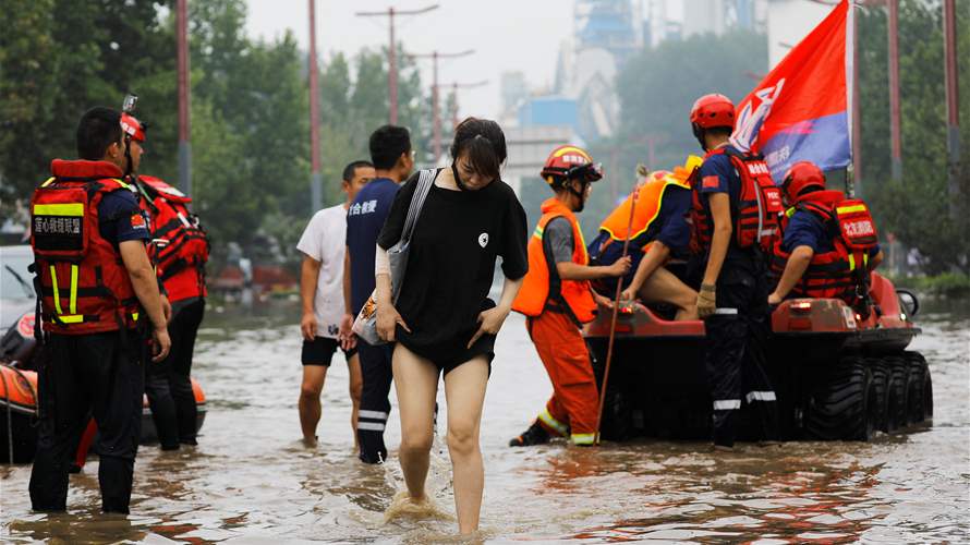 Floods leave at least 10 dead in proximity to Beijing 