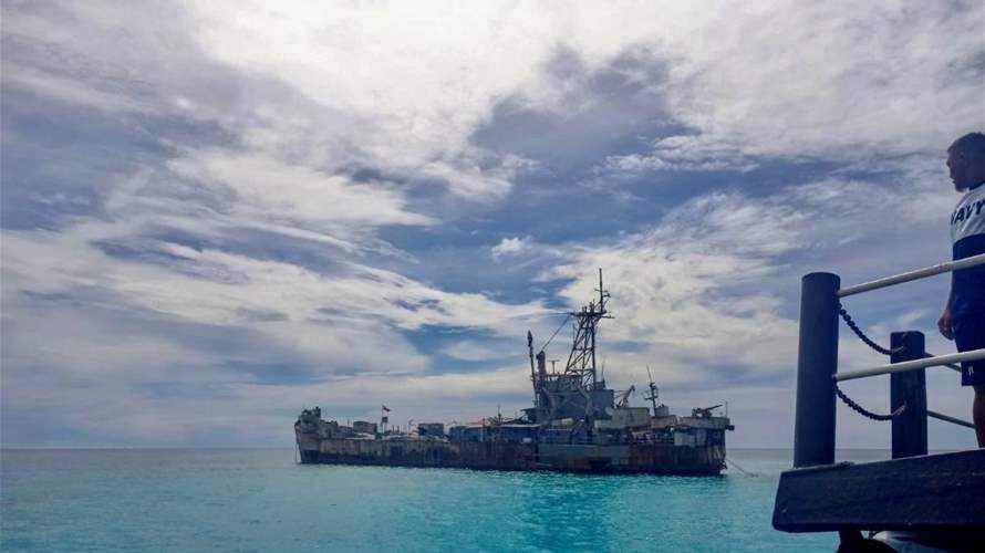 China demands Philippines withdraw vessel parked in disputed waters