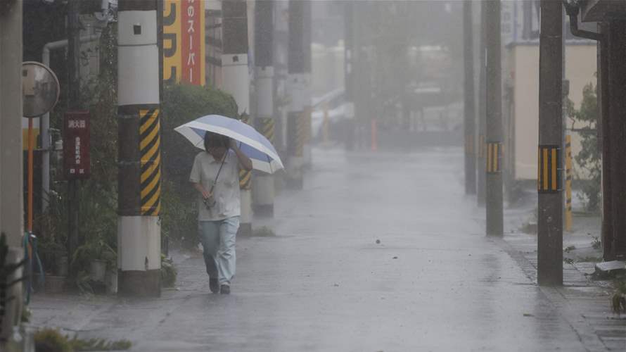 Tropical storm Lan hits western Japan with strong winds and heavy rain