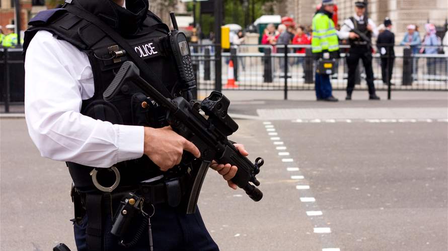 London policemen abandon arms after one of them is charged with murder