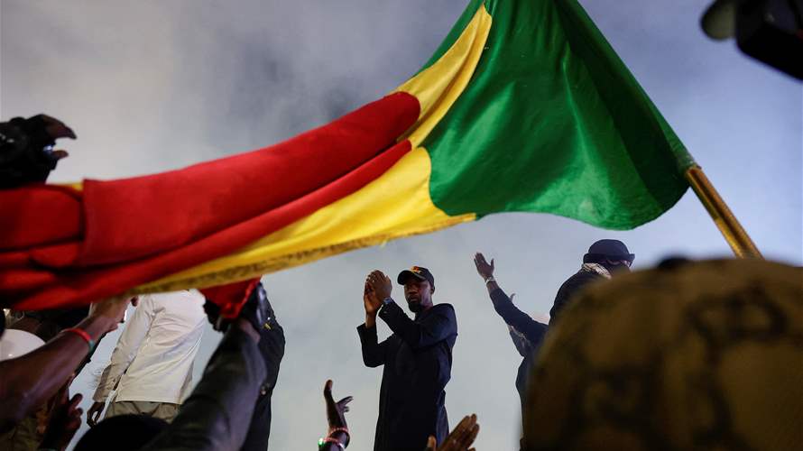 Senegal begins voting in delayed presidential elections