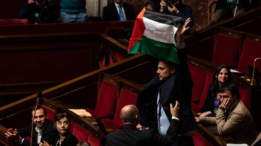 French hard-left MP suspended for waving Palestinian flag in parliament