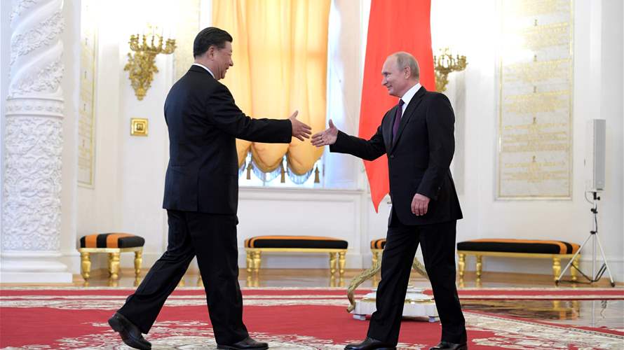Putin greets China's Xi at Kremlin