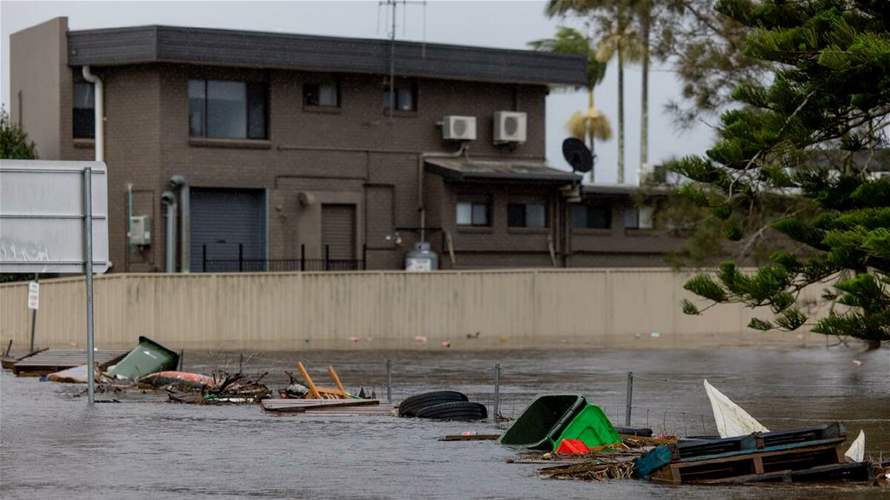 Death toll in Australia floods rises to four, tens of thousands stranded