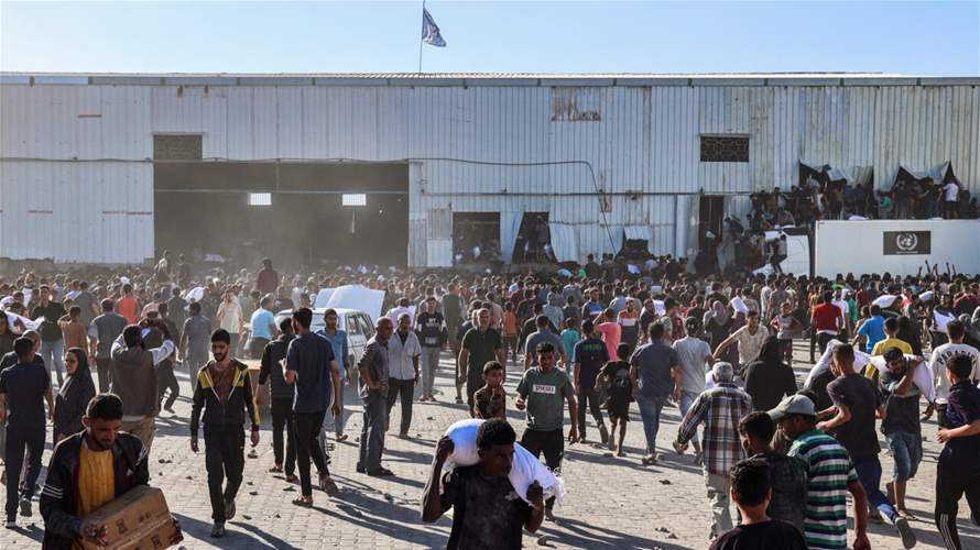 Thousands loot UN warehouse in central Gaza amid a hunger crisis