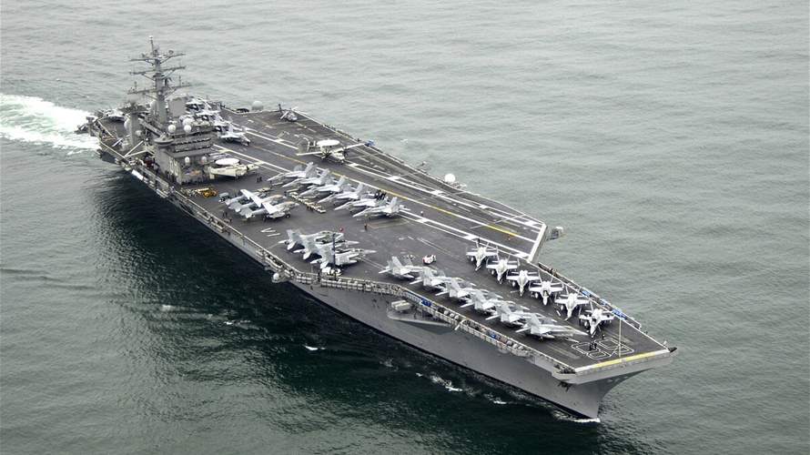 US aircraft carrier heads west from South China Sea amid Middle East tensions