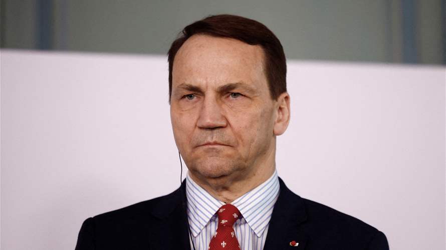 Poland's Sikorski says arms race could lead to Putin's fall, like it toppled USSR