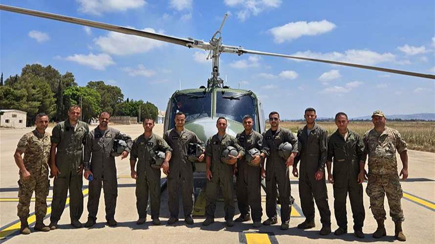 Lebanese Army helicopters return from firefighting mission in Syria's Latakia countryside
