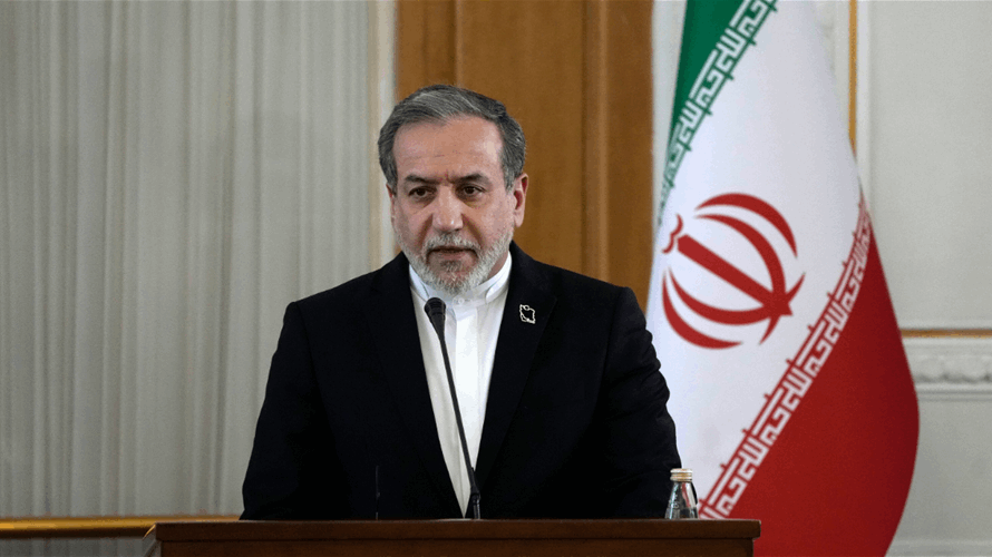 Iran says negotiating with 'all our might' to prevent sanctions snapback