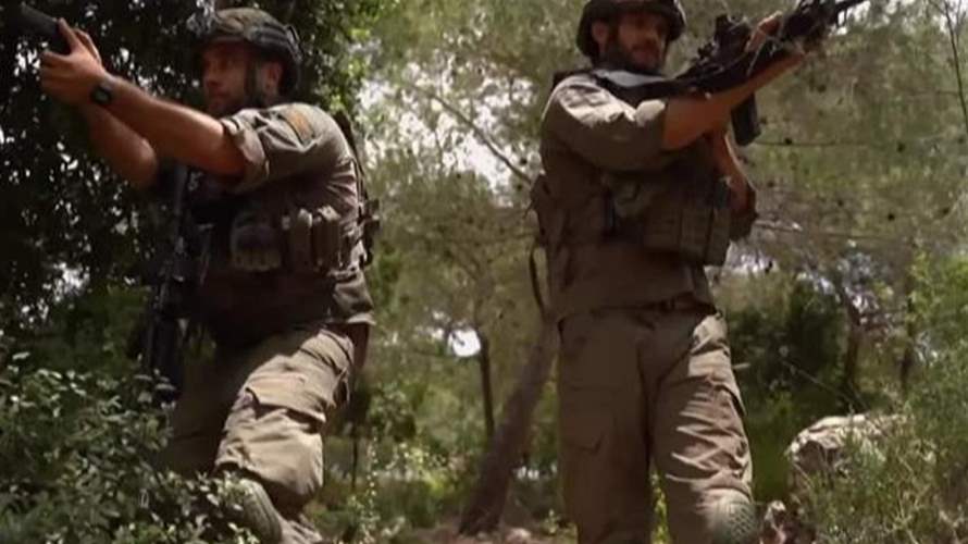 إسرائيل تفاوض سوريا وتحشد قواتها قرب الحدود مع لبنان