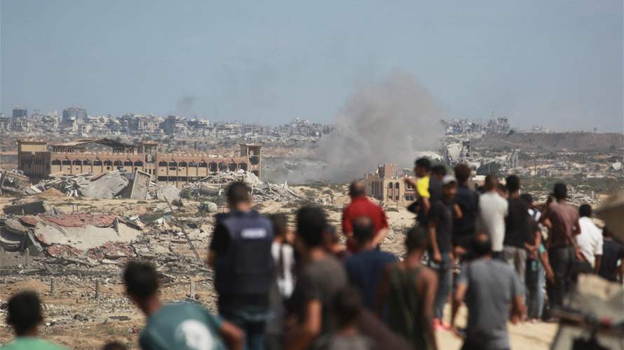 Gaza civil defense says 52 killed in Israeli strikes