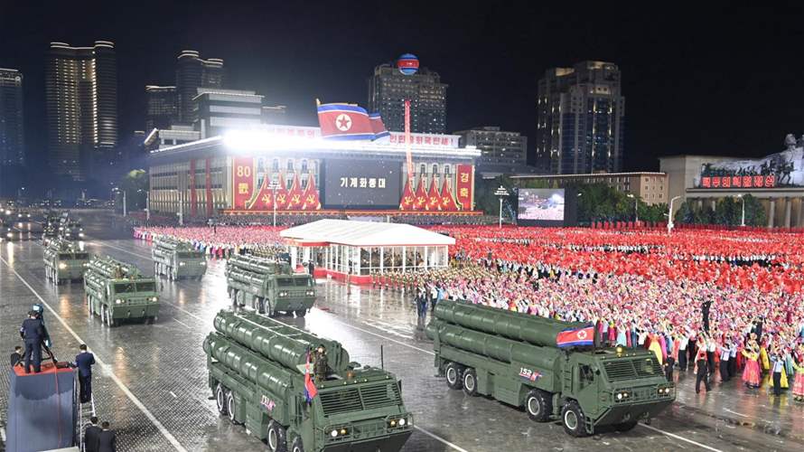 North Korea holds military parade, shows off new intercontinental missile