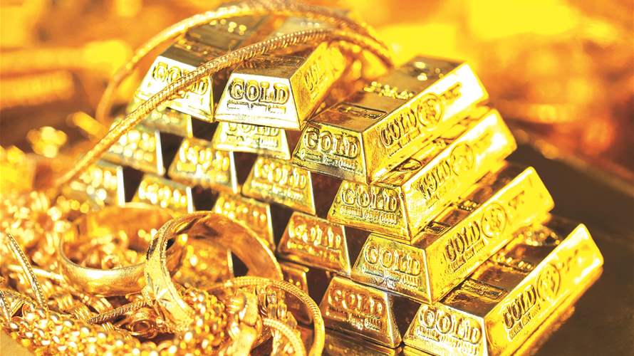 Gold prices slide further as dollar firms, investors book profits