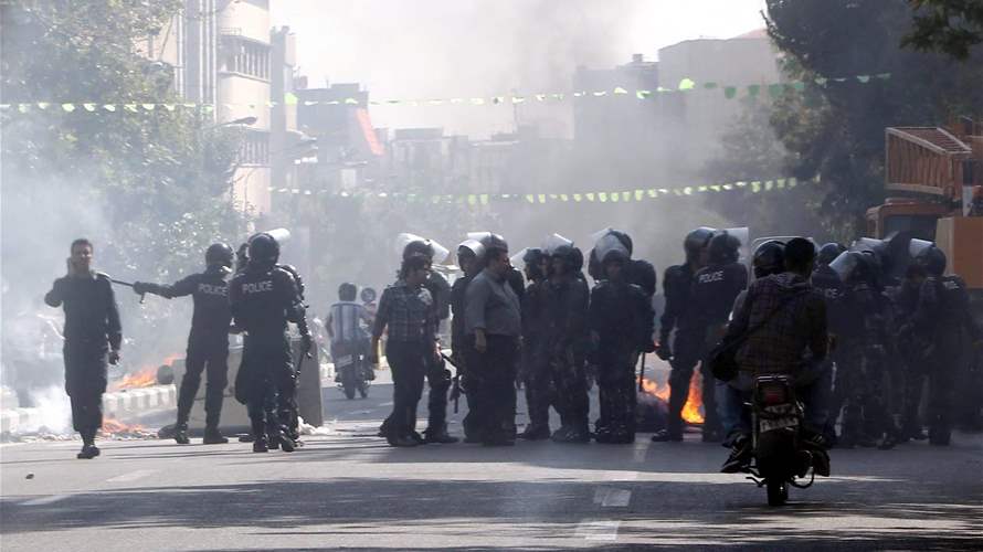 Iran police officer killed in stabbing during unrest near Tehran 